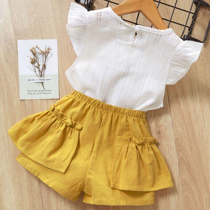 Комплект для девочек 0-5 лет. Минималистичный топ с короткими рукавами для маленьких девочек. Повседневные шорты. Удобный комплект из двух предметов для детей.