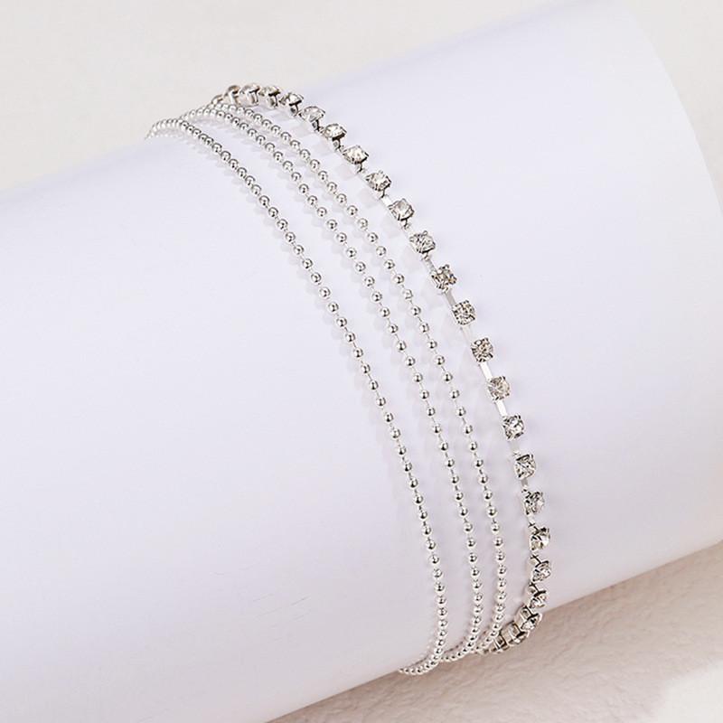 Многослойные цепочки на щиколотке Летние пляжные цепочки на щиколотке Уличные фотографии Металлические цепочки Круглые цепочки из бисера Цепочки на щиколотках со сверкающими бриллиантами