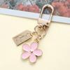 1Pcs Korean Hot-Selling Ins Metal Style Daisy Keychain Niche Usb Headphone Pendant Bag Protective Cover Pendant