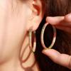 Серьги-кольца CMM двухцветного золотого цвета с радугой и кубическим цирконием