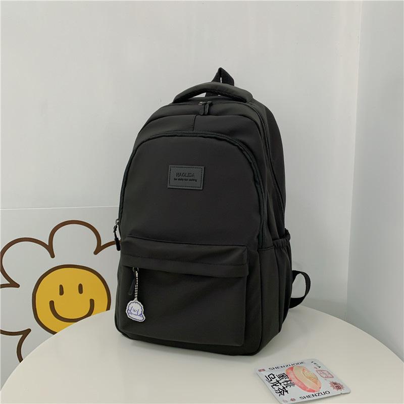 New simple solid color schoolbag simple high school student junior high school student backpack large capacity computer backpack