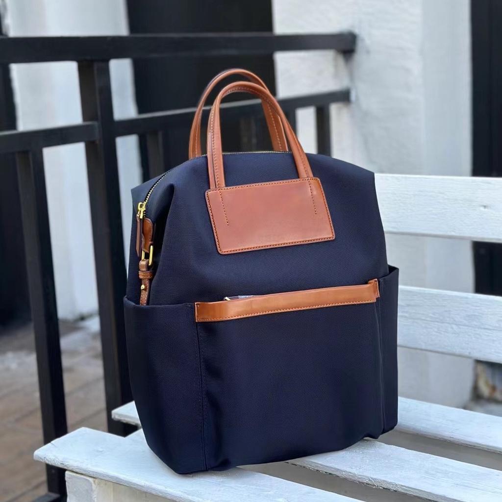 Ткань Оксфорд в сочетании с кожаным рюкзаком растительного дубления. Новые модные и универсальные рюкзаки для мужчин и женщин. Нишевый и высококлассный смысл.