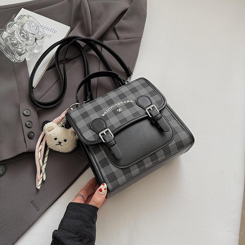 Casual plaid women's backpack 2025 summer new small backpack high value contrasting color portable small schoolbag