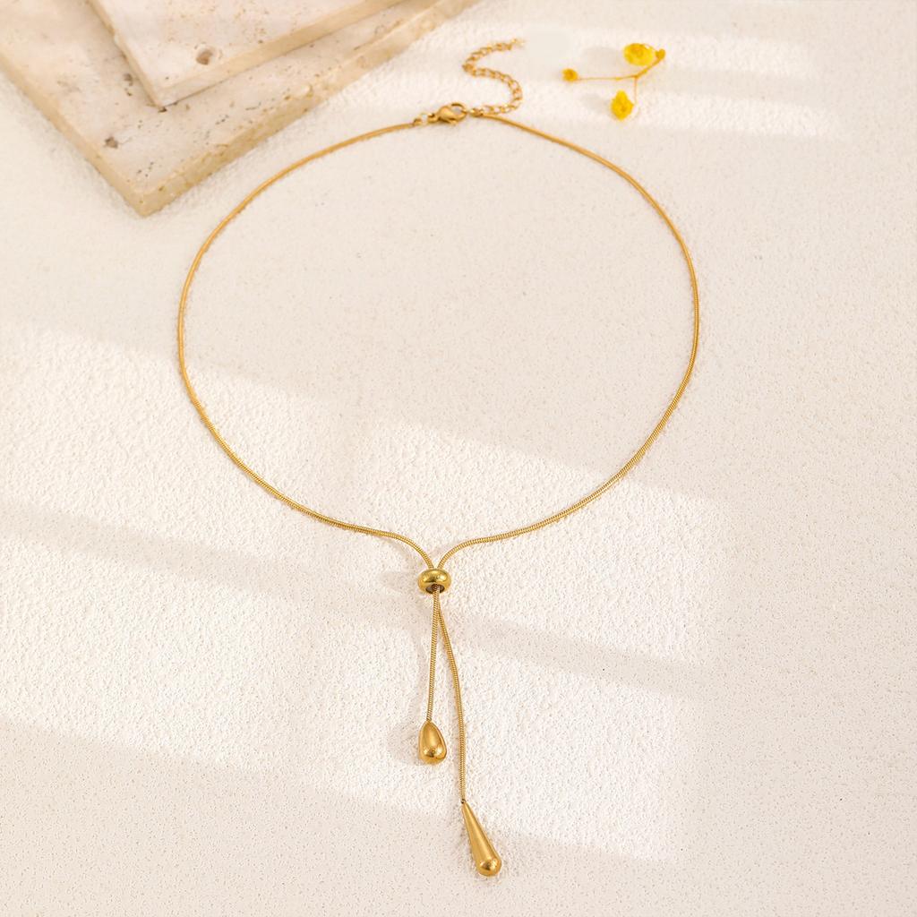 Golden Water Drop Pendant Alloy Necklace, a Cold and Elegant, Light Luxury and Niche Sweater Chain for Women