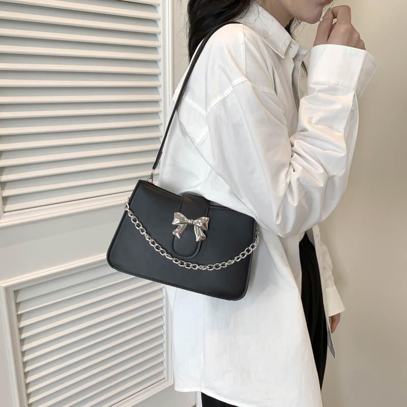 Сумка через плечо с бантом и цепочкой в иностранном стиле, женская, весна-лето, новая модная корейская версия, универсальная однотонная сумка с нишевой текстурой