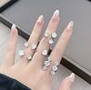 Звездный свет на кончике пальца~ Взрывное кольцо с цирконом с двойной головкой Женское нишевое дизайнерское кольцо для суставов Легкая роскошь Продвинутое чувство Кольцо для ношения в несколько рядов