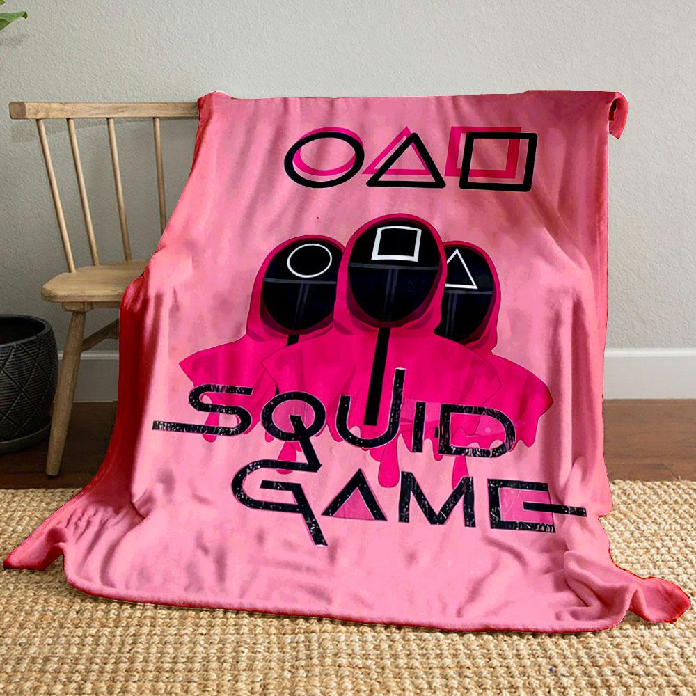 Geometric shapes with masked figures in pink costumes and bold text. for all seasons blanket lunch break throw gift