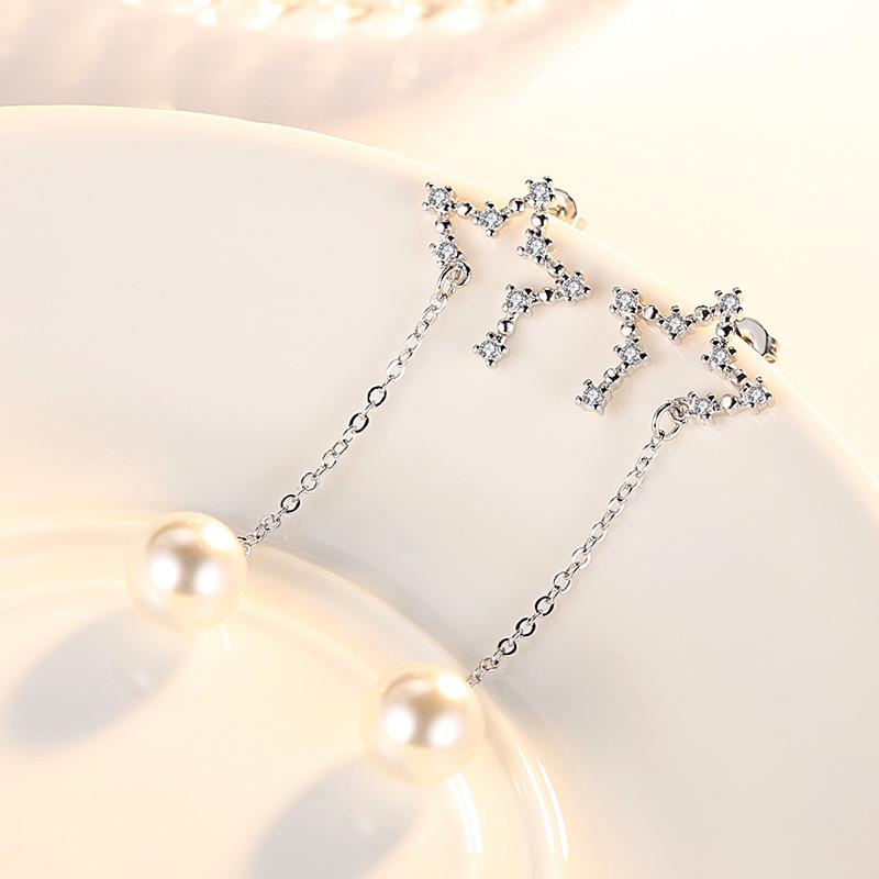 Серьги-гвоздики с кисточками в виде преувеличенных звезд, серьги-гвоздики, цирконовый метеорит, средняя и длинная жемчужина, простая индивидуальность, серьги-пентаграммы.