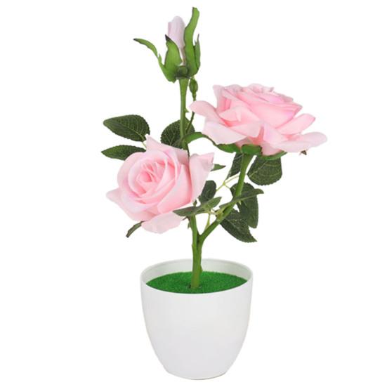 Длительное поддельное растение в горшке отрезало равномерно декоративную портативную машинку