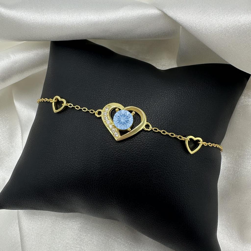 Pozłacana bransoletka srebrna 925 z kryształem light sapphire - złoto 24k