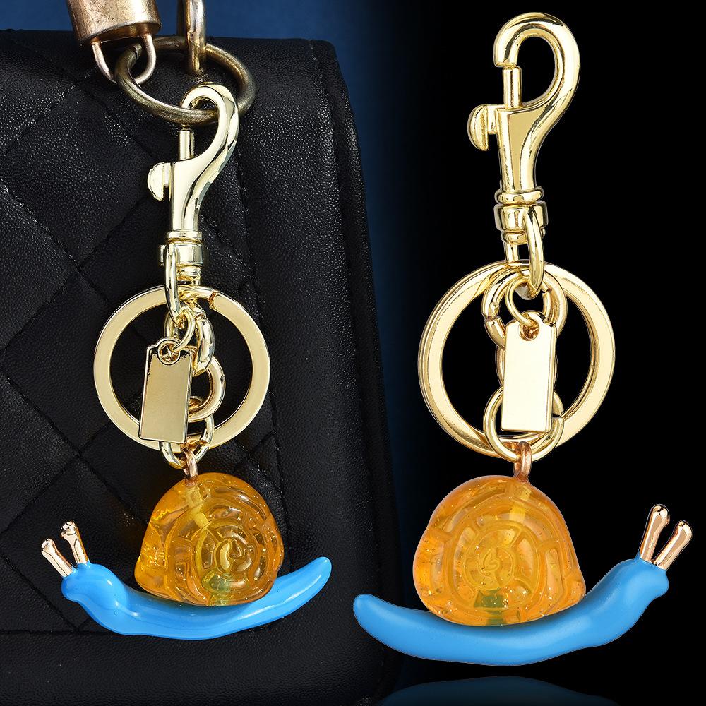 Retro Gold Oil Drop Snail Keychain Multi-Color Glitter Bag Pendant Light Luxury Niche Car Key Chain Versatile Pendant