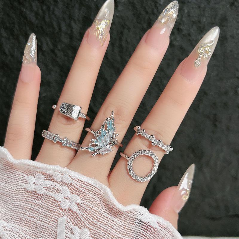 Irregular pleated texture Minimalist Korean flapper butterfly open ring Female alphabet full diamond fashion niche ring