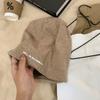 Letter Black Stack Hat Women'S Autumn And Winter Japanese Leisure Big Head Circumference Showing Face Small Bag Head Cold Hat Warm Confinement Hat