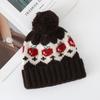 Fair Island wind red strawberry hairball wool hat women's autumn and winter cute cold and warm mountaineering ear protection knitted hat