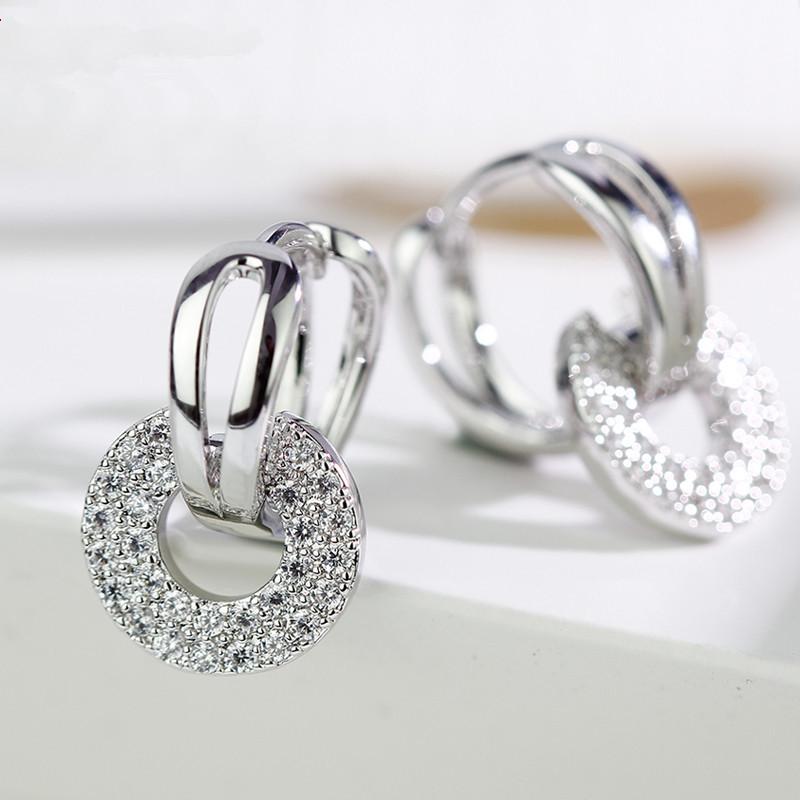2026 high-end fashion Korean version women's round micro-inlaid zircon ear buckle versatile earrings silver design ear jewelry