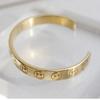 Smile Line Up Open Gold Bangle Bracelet