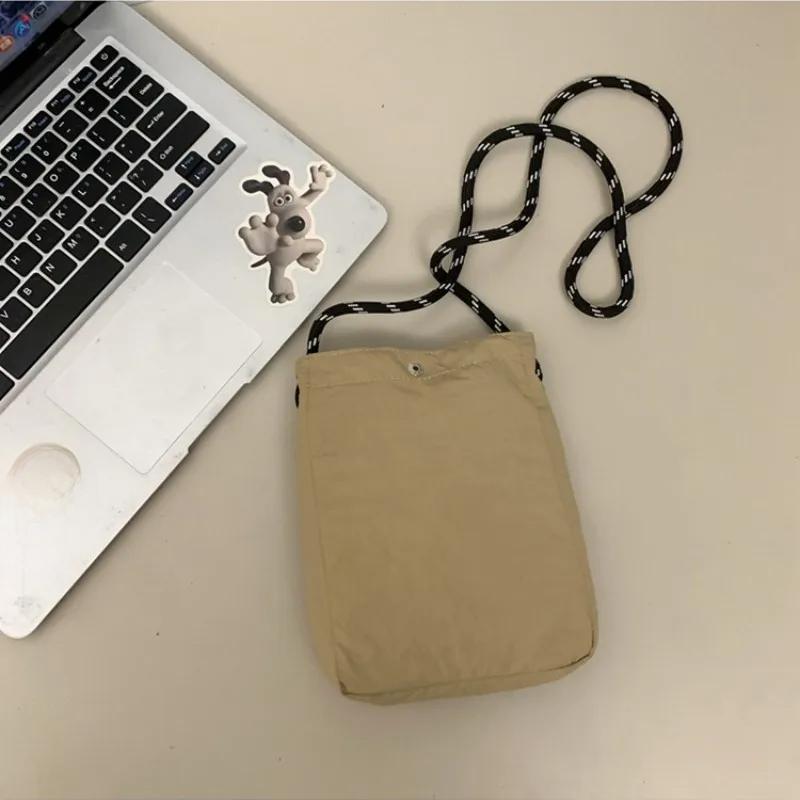 Мини-сумка из нейлона для мужчин и женщин, шикарная сумка-ведро через плечо, повседневная маленькая сумочка с завязками на шнурке, кошелек для телефона, Корея