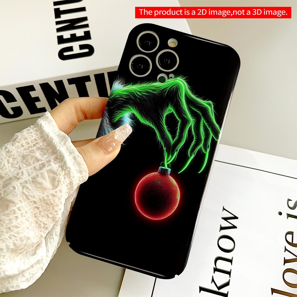 2DFlat Green Grinch Hand Holding Red Ornament All inclusive film hard phone case, compatible with iPhone 18 Pro Max 17 16 15 14 13 12 11
