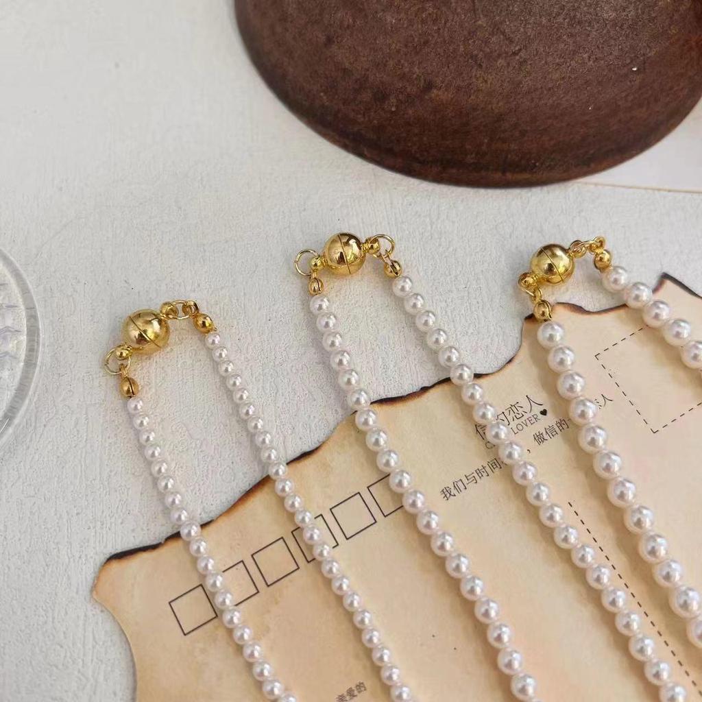 Elegant Magnetic Pearl Clavicle Necklace – High-End Versatile Sweater Chain for Women