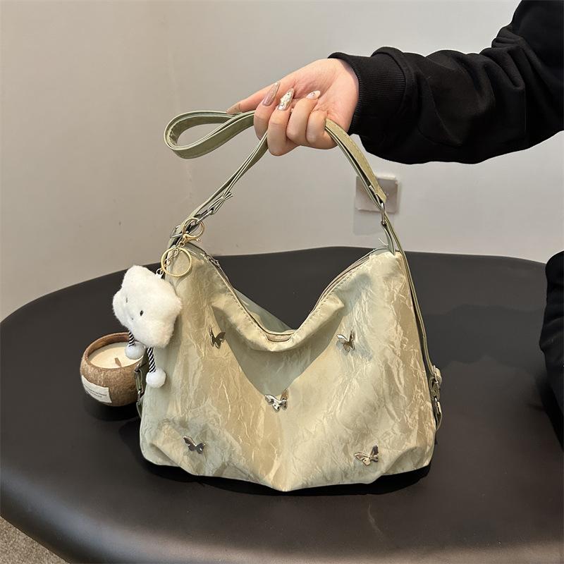 Мягкая кожа бабочка большая вместимость высокая ценность нежная наплечная сумка 2025 лето новая женская наплечная сумка-мессенджер тоут