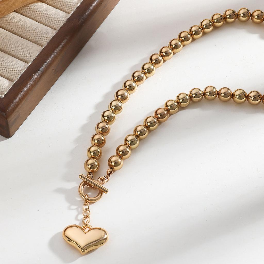 Преувеличенная геометрическая цепочка на шею с круглыми бусинами, женская универсальная, с имитацией жемчуга, горячо продаваемое ожерелье с бусинами и подвеской в виде сердца