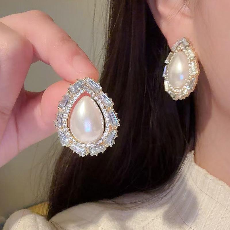 Серебряные серьги-кисточки с жемчугом и иглами - модные универсальные женские украшения