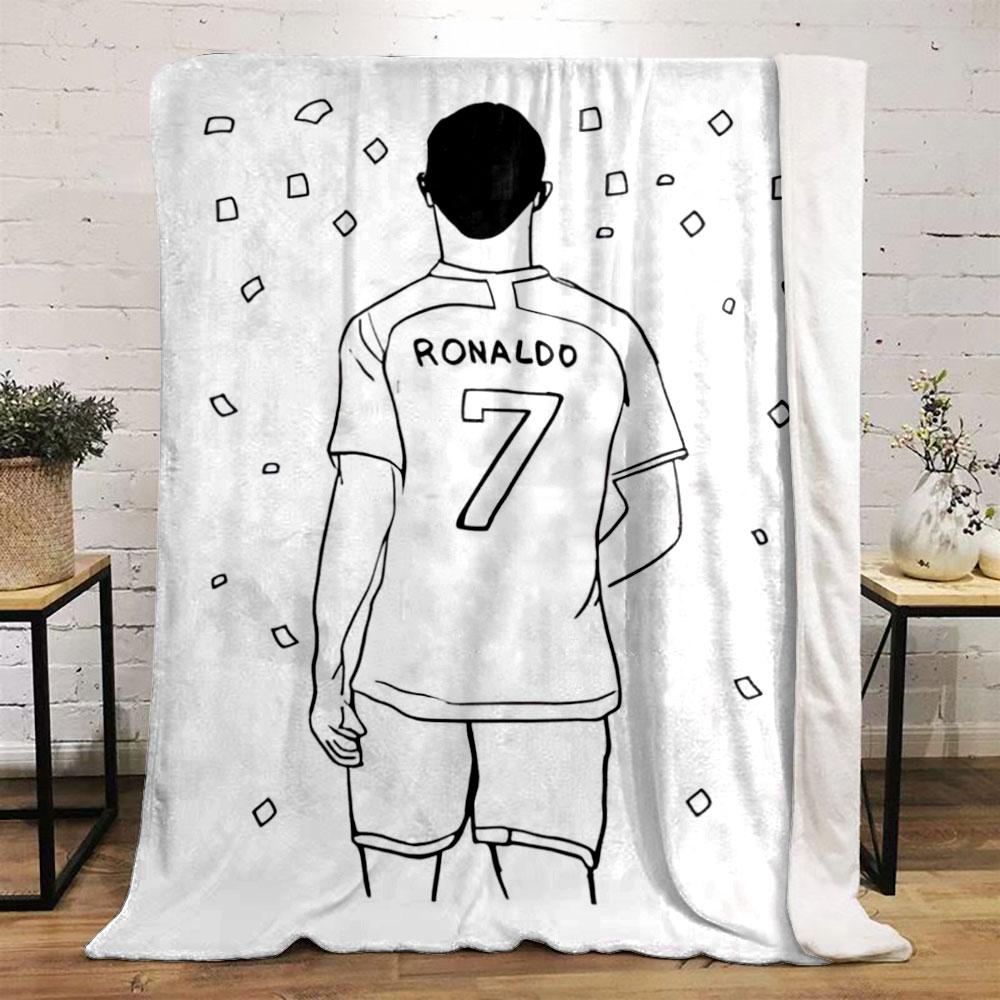 A person wearing a jersey labeled "RONALDO" with "7" surrounded by confetti. for all seasons blanket lunch break throw gift