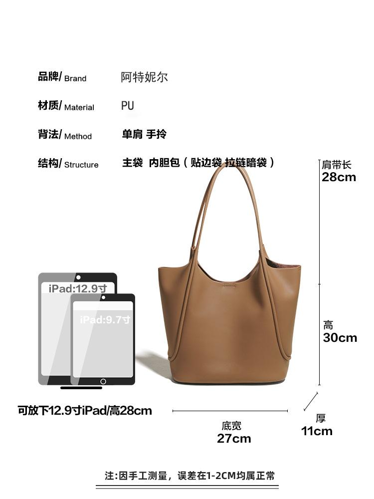 Simple and large-capacity cowhide tote bag 2025 new fashion niche high-end soft leather shoulder commuter bag