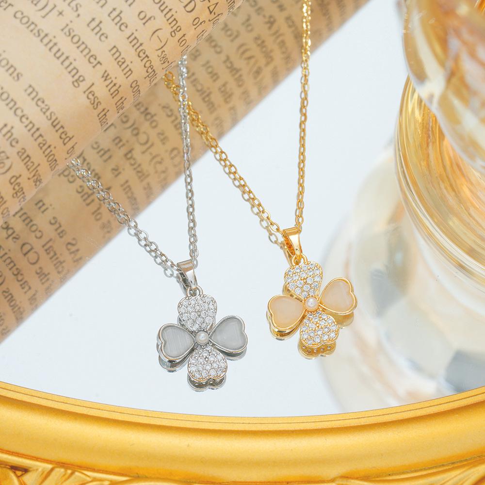 Ожерелье с четырьмя листьями и цветком для женщин, модная цепочка на ключицу, новый свет, роскошный нишевый универсальный камень кошачий глаз