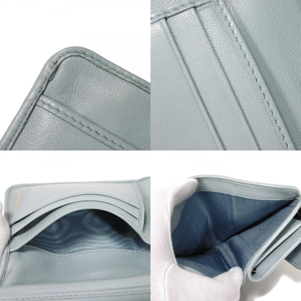 Б/у Компактный кошелек на молнии с узором Matelasse (5ML002 N88 F0012 7941) с RFID и кожей ягненка. Металлический логотип. Женский Cielo из Японии