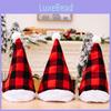 Cozy Red And Black Plaid Christmas Hat With Soft White Fur Pom Poms For Festive Cheer