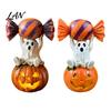 Whimsical Ghost Statue Halloween Figurine, Cute Sitting on Pumpkin Holding Candy Souvenir Gift Statue, Spooky Resin Table Ornament for Indoor