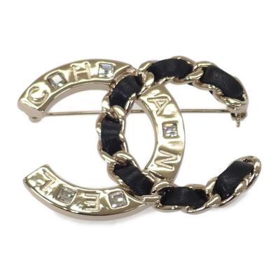 Брошь золотистый металл/кожа Женская