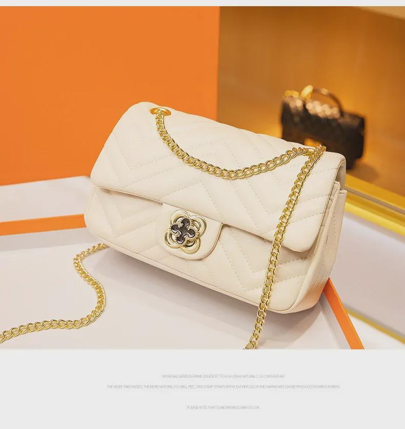 Женская сумка через плечо из натуральной кожи с замком-четырехлистником и цепочкой с бриллиантами