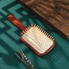 Tan Mujiang Lotus Wood Air Cushion Comb