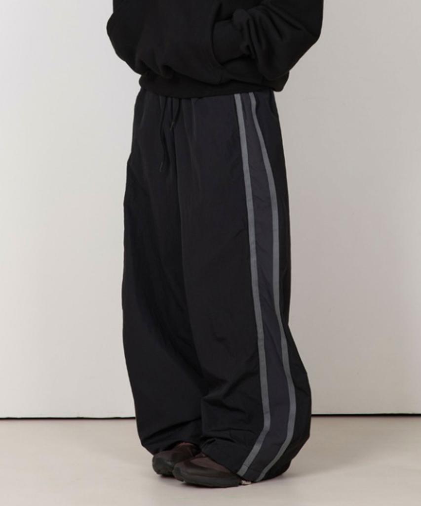 BOUNDARY Side Color Block Tape Nylon Track Pants [Black]
