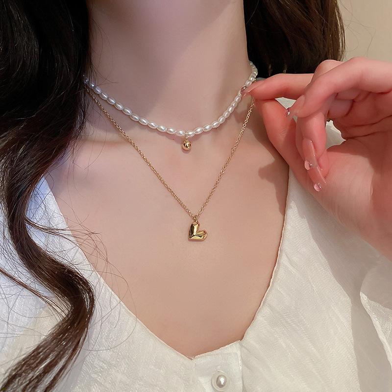 Korean temperament love butterfly pearl fringed necklace fashion collarbone chain versatile item decoration