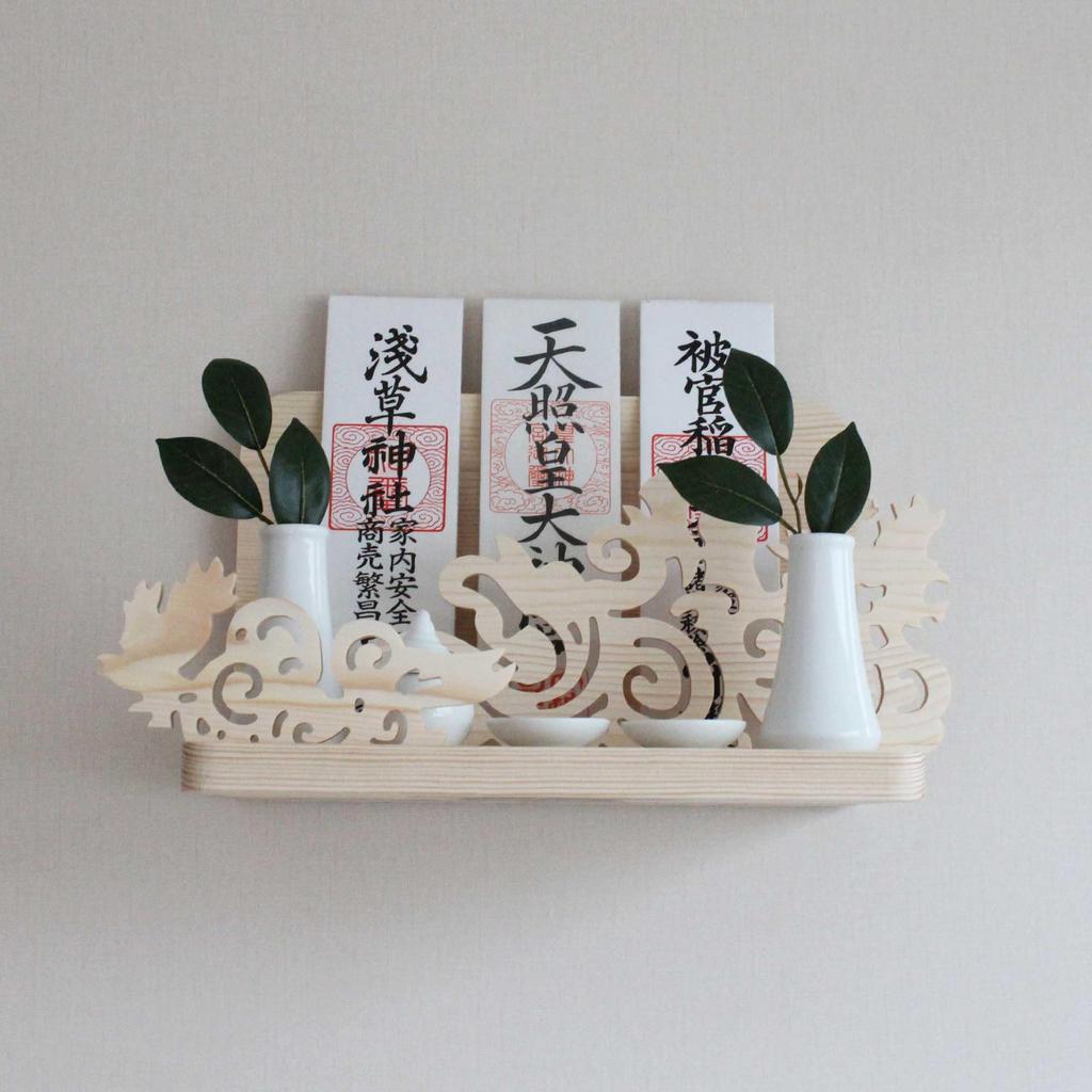 Shinto altar, amulet stand, wall-mounted, with relief carvings of a three-legged bird, auspicious clouds, and the moon, suitable for ancestral shrines