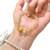 Natural golden rutilated quartz and yellow tiger eye stone bracelet with copper coins for wealth and good fortune, a light luxury niche accessory