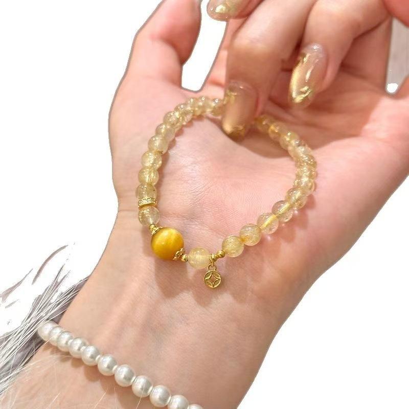 Natural golden rutilated quartz and yellow tiger eye stone bracelet with copper coins for wealth and good fortune, a light luxury niche accessory
