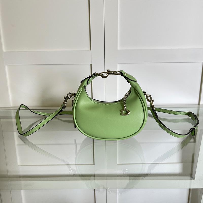 "2024 Women's Jonie Mini Retro Half-Moon Underarm Crossbody Bag"