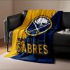 A buffalo and crossed sabers in a circular logo on a blue and yellow background. for all seasons blanket lunch break throw gift