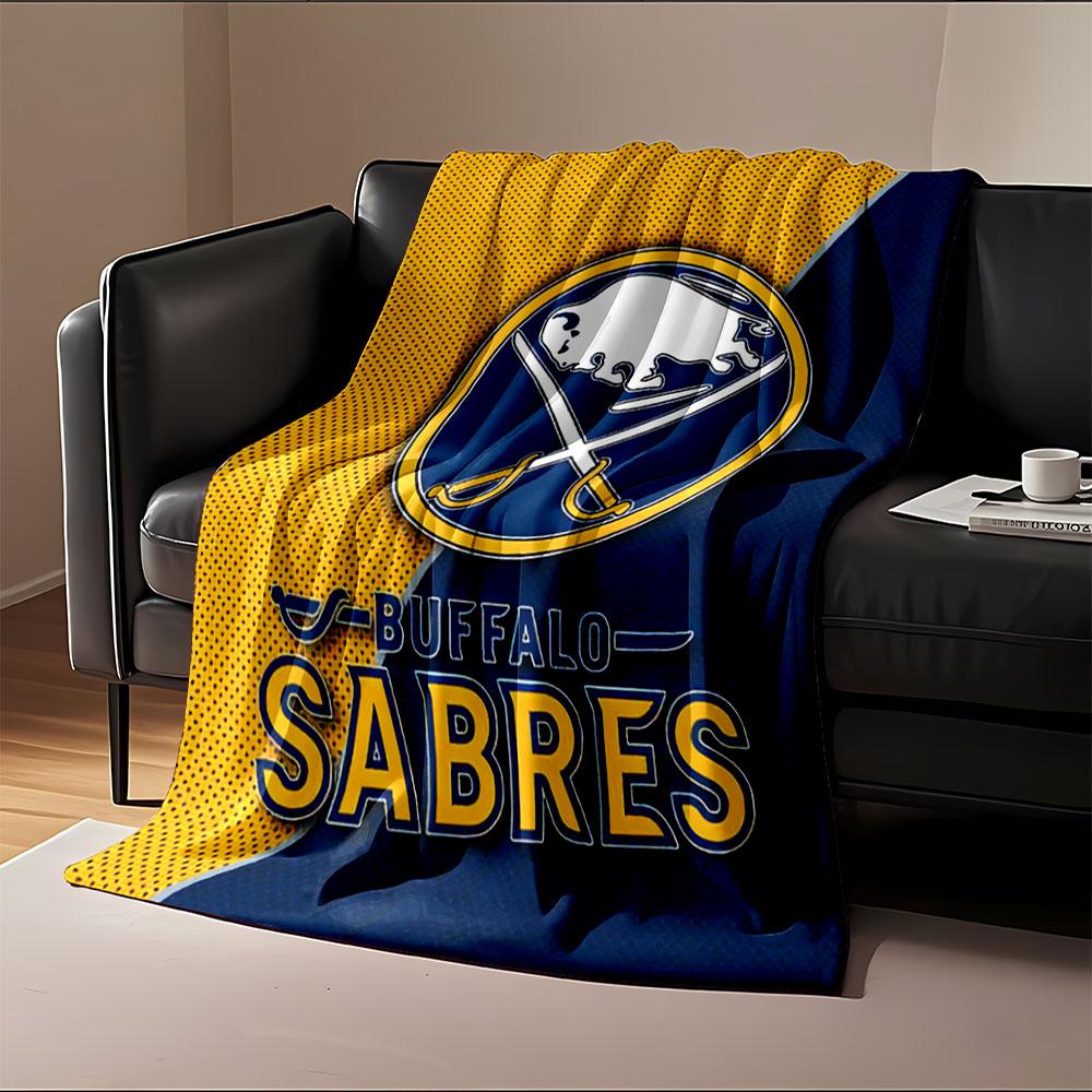 A buffalo and crossed sabers in a circular logo on a blue and yellow background. for all seasons blanket lunch break throw gift