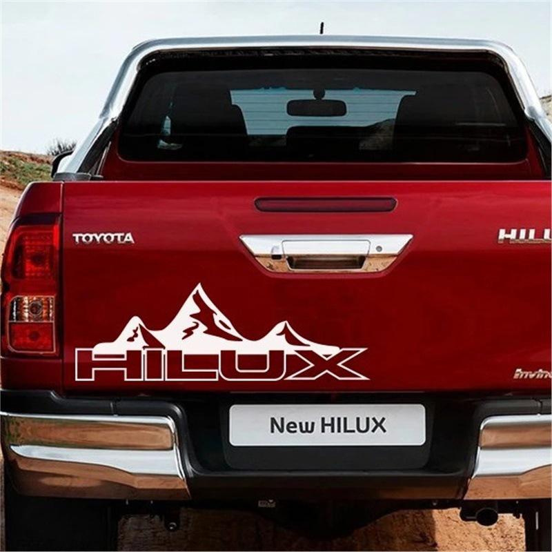Наклейки на двери и багажник пикапа Toyota Hilux Revo Vigo "Горы"