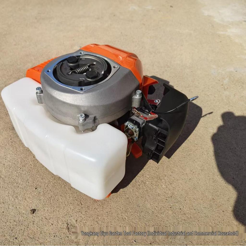 Бензиновый двухтактный мотобур: Портативный инструмент для прополки и выкапывания ям в саду
