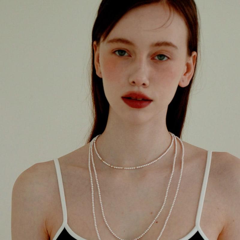 Less is more long pearl necklace