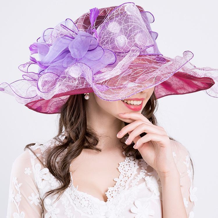 A new summer anti-ultraviolet European and American women's fashion hat, big flower fashion mesh hat, big edge hat.