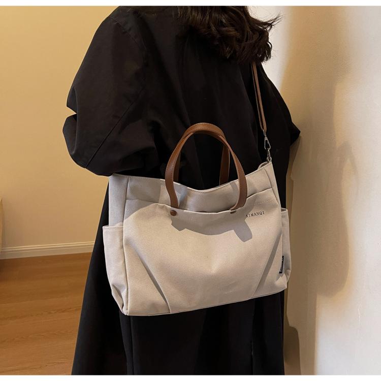 Большая вместительная повседневная сумка-тоут из холста женская сумка 2024 года новая универсальная сумка для поездок на работу простая сумка-мессенджер