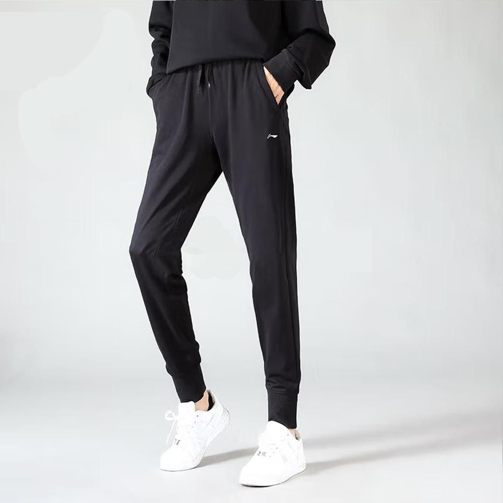 Спортивные брюки Li Ning Fitness Series с однотонным логотипом и эластичным поясом, с манжетами, женские брюки черного цвета AKLS786-1