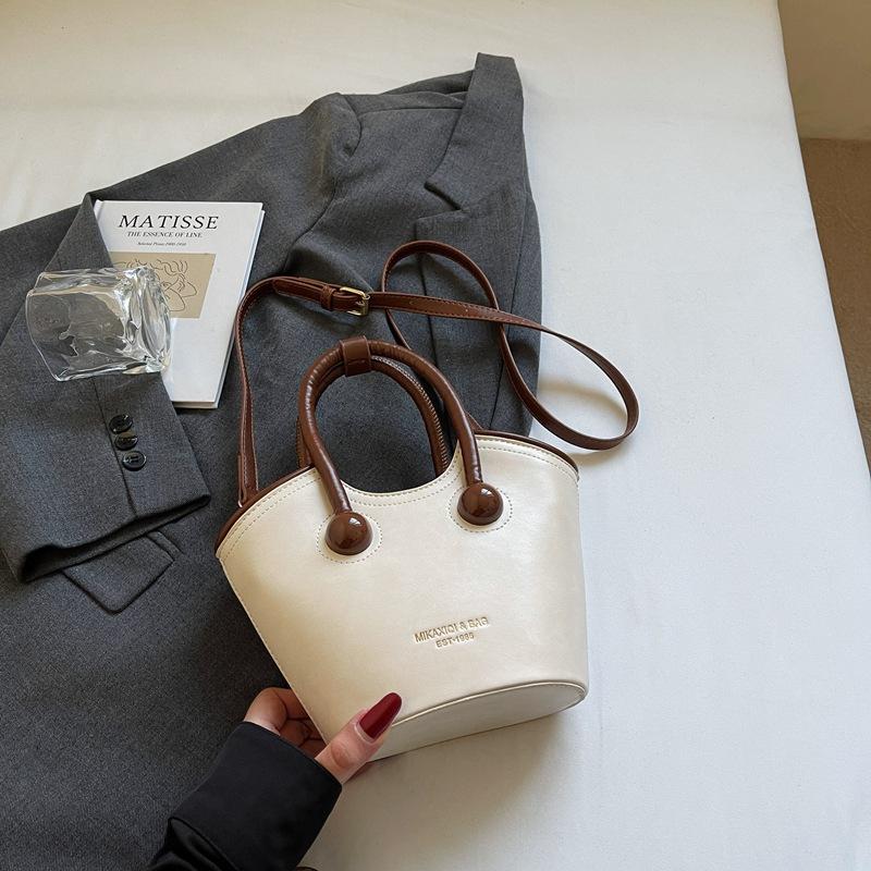 Корейская нишевая сумка женская 2025 новая весна и лето универсальная сумочка популярная одноплечевая сумка-мессенджер сумка-ведро